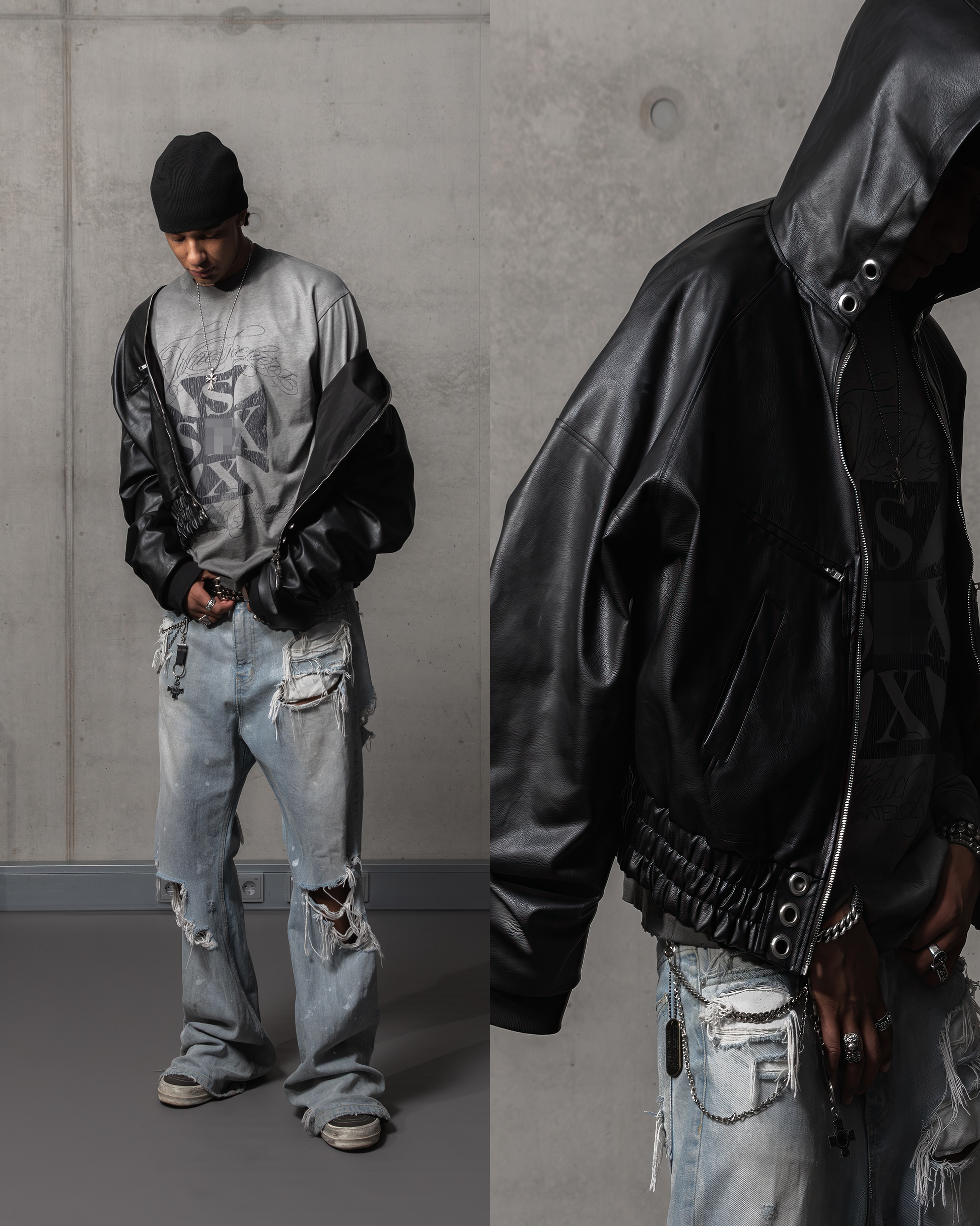 Person wearing a black leather jacket and light blue jeans against a gray concrete wall.